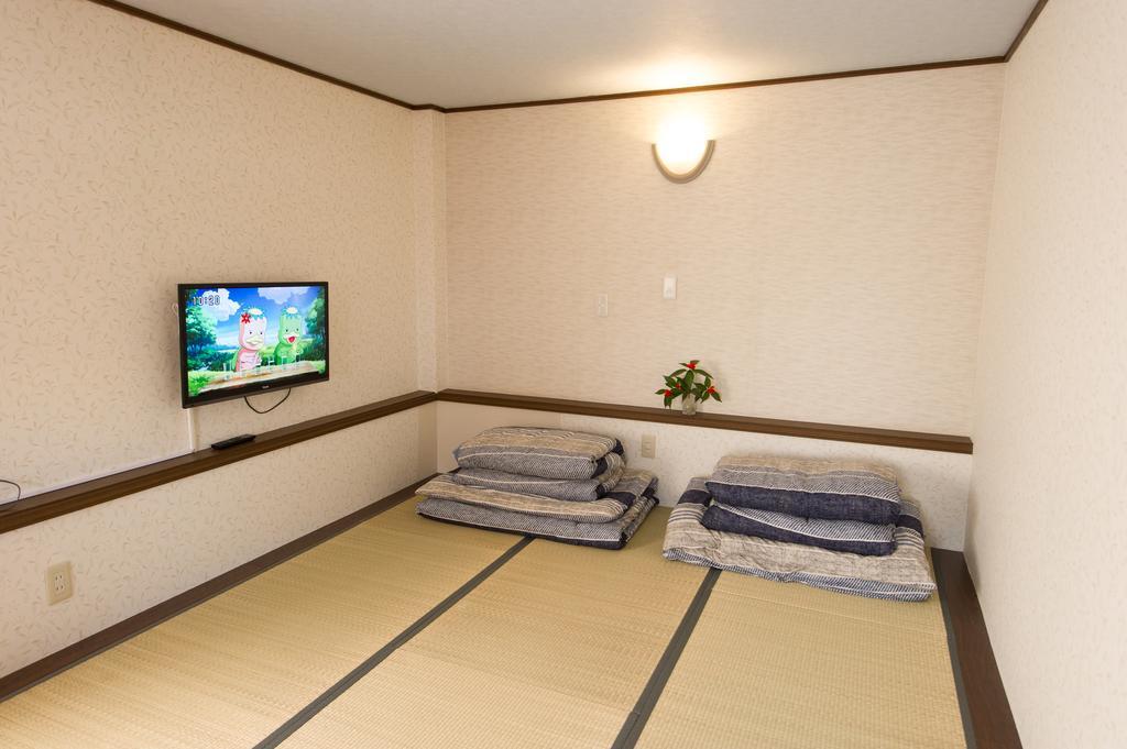 Guest House Izumi Extérieur photo
